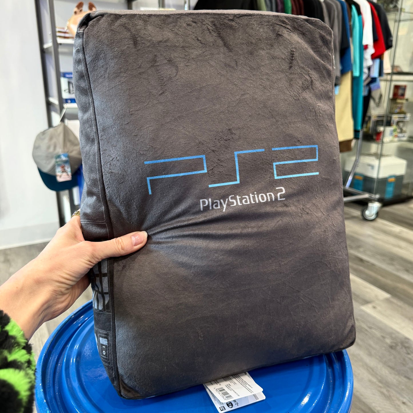 Pillow made to look like a PlayStation 2 console. Black with blue logo.