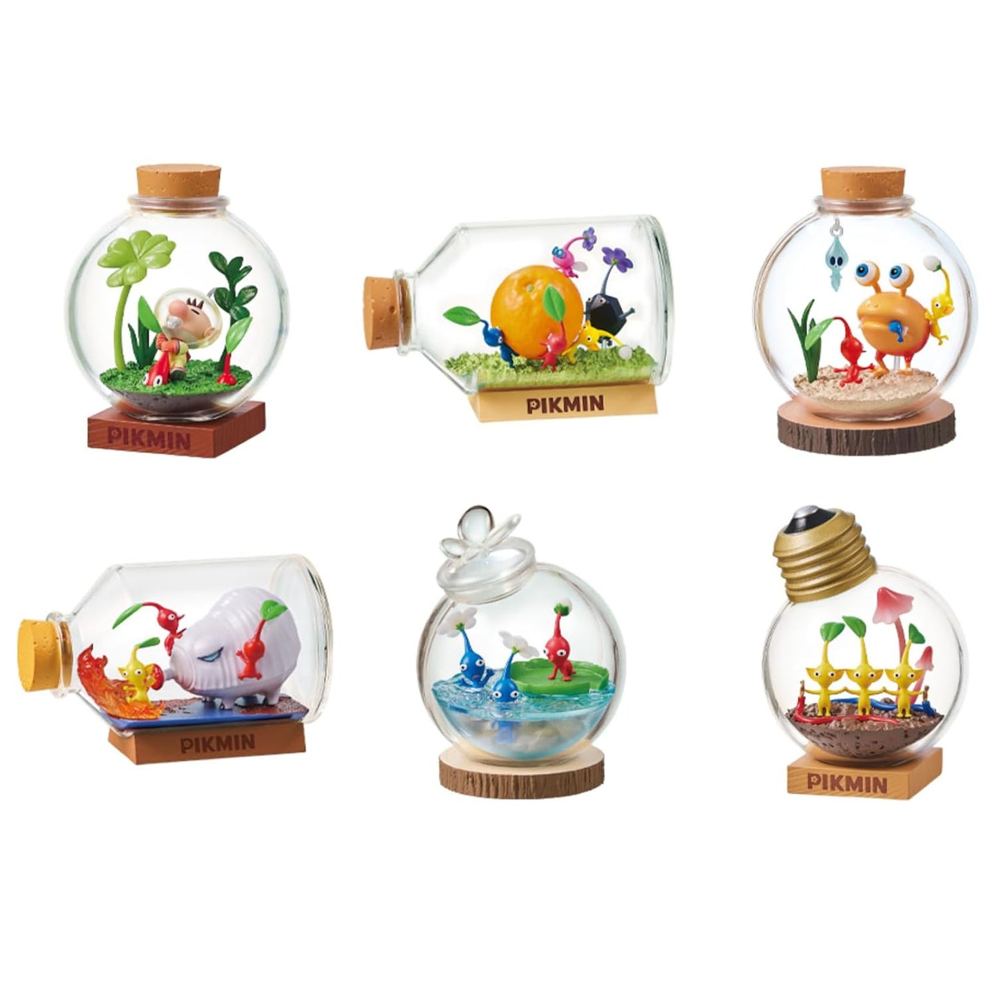Miniature Pikmin terrariums on a white background.