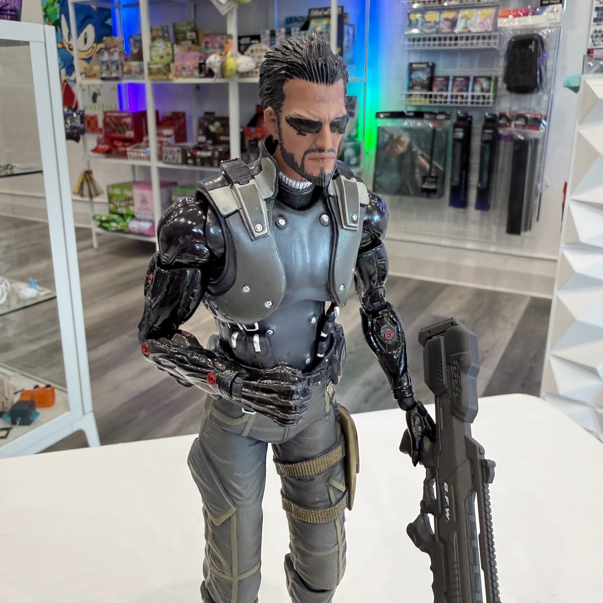 Action figure in a store setting with shelves in the background