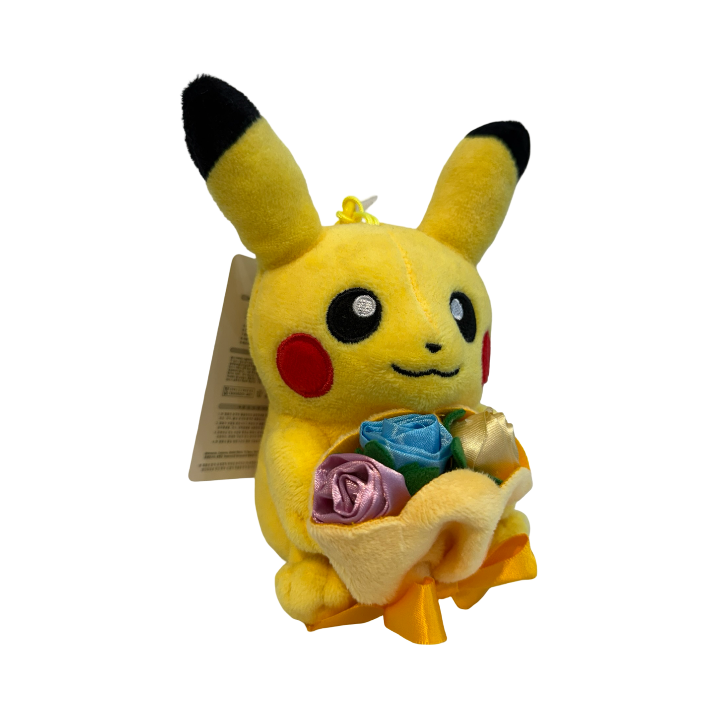 Plush Pokémon of Pikachu holding a bouquet of plush roses 