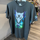 Grey tshirt with Pokémon Alolan Marowak graphic in purple, blue, and green