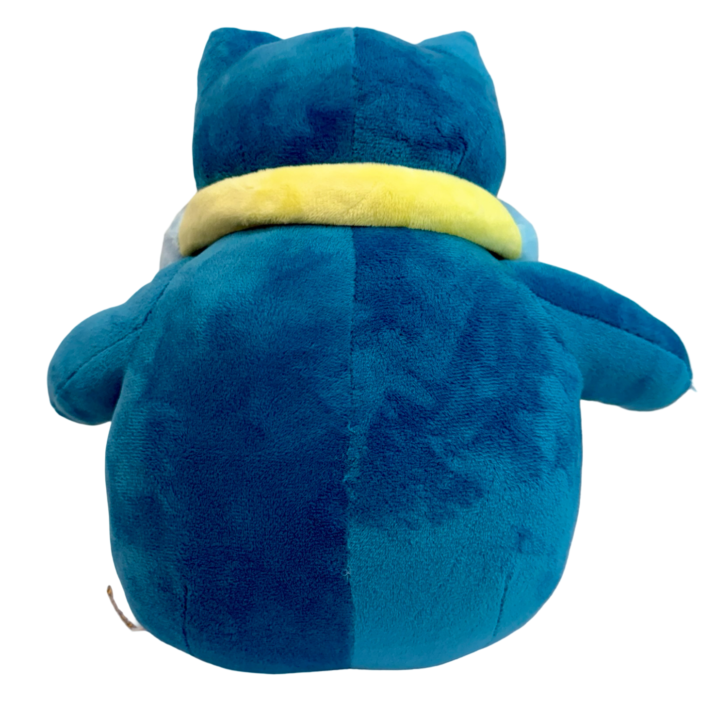 Plush Snorlax with headphones around his neck and music player hanging down. 