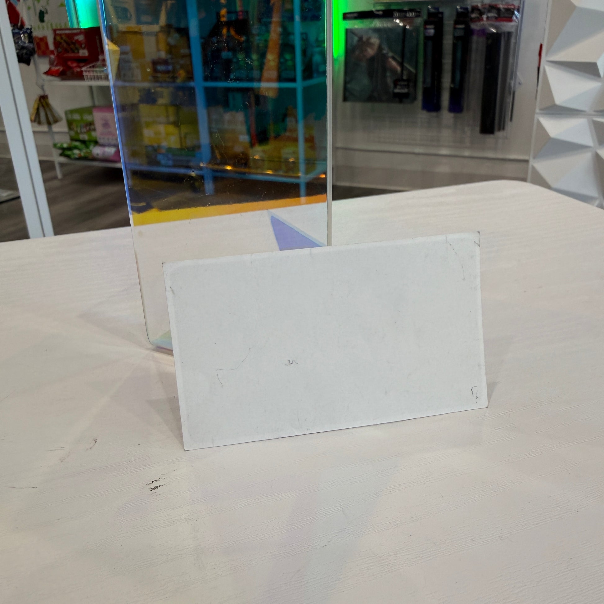 Back of Halo 2 sticker with a store in the background