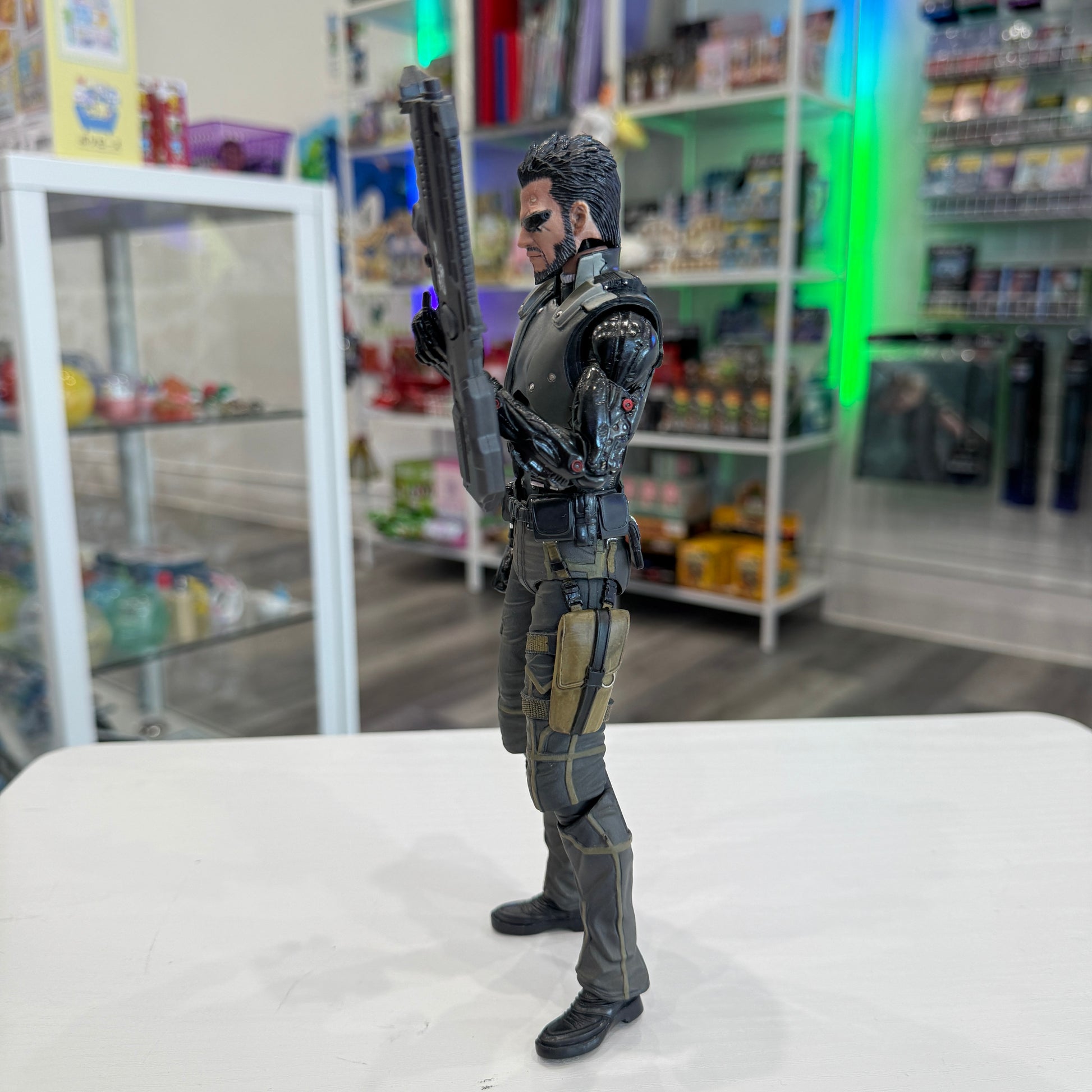 Action figure in a store setting with shelves in the background