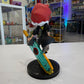 Red haired cartoon girl with futuristic sword on a black base with a shop in the background. 