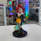 Red haired cartoon girl with futuristic sword on a black base with a shop in the background. 