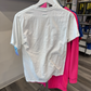 Back of white tshirt hanging on a rack