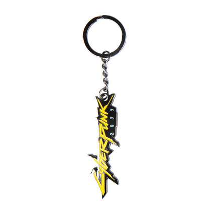 Cyberpunk 2077 metal keychain in yellow text on a white background