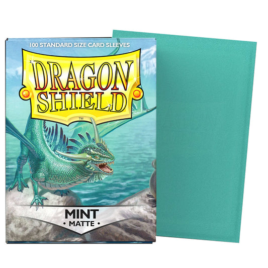 Dragon Shield card sleeves in mint color with packaging featuring a dragon illustration.