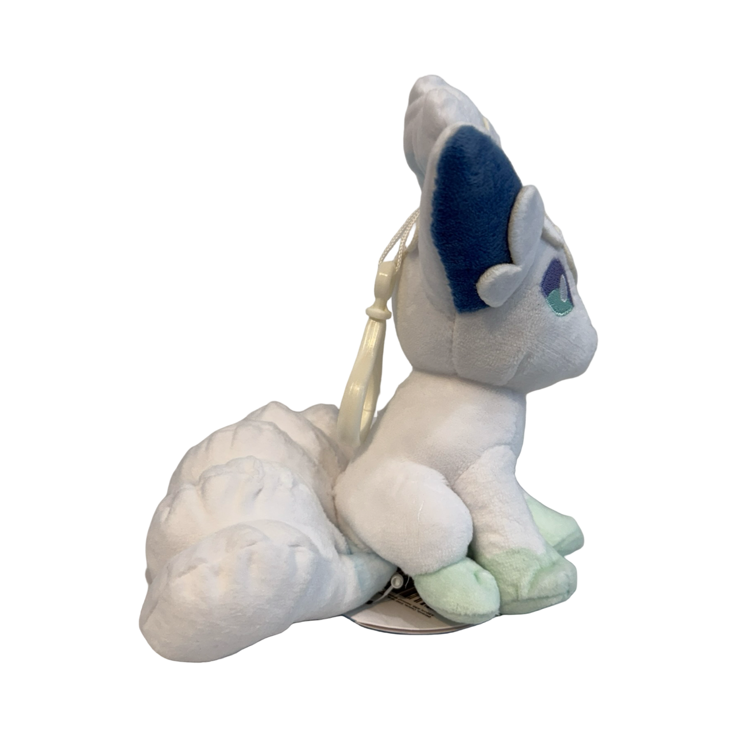 Plush keychain of Pokèmon, Alolan Vulpix. White and blue in color. 