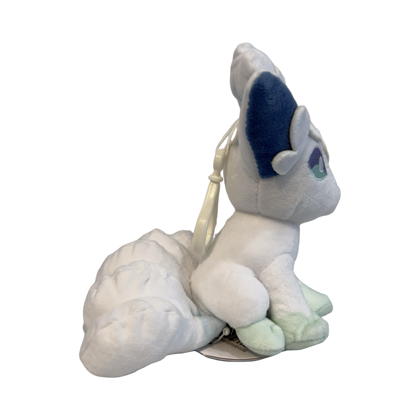 Plush keychain of Pokèmon, Alolan Vulpix. White and blue in color. 