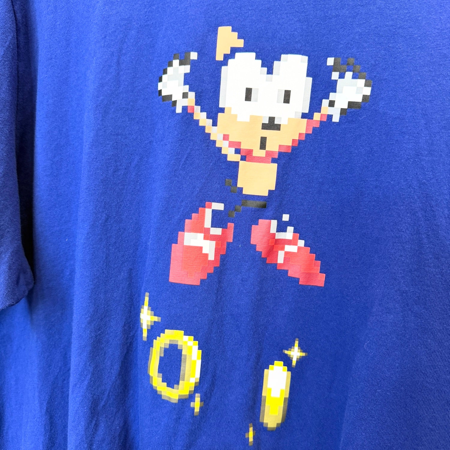 Close up of blue shirt with Sonic the Hedgehog graphic