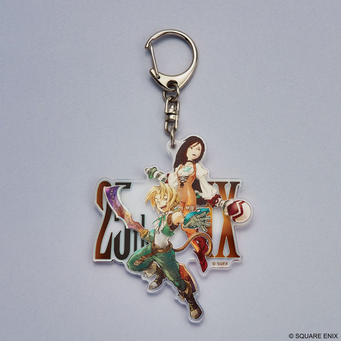 Acrylic keychain with design from Final Fantasy IX on a metal clasp. 