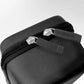 Black zippered pouch with 'Gamegenic' branding on zippers a white background