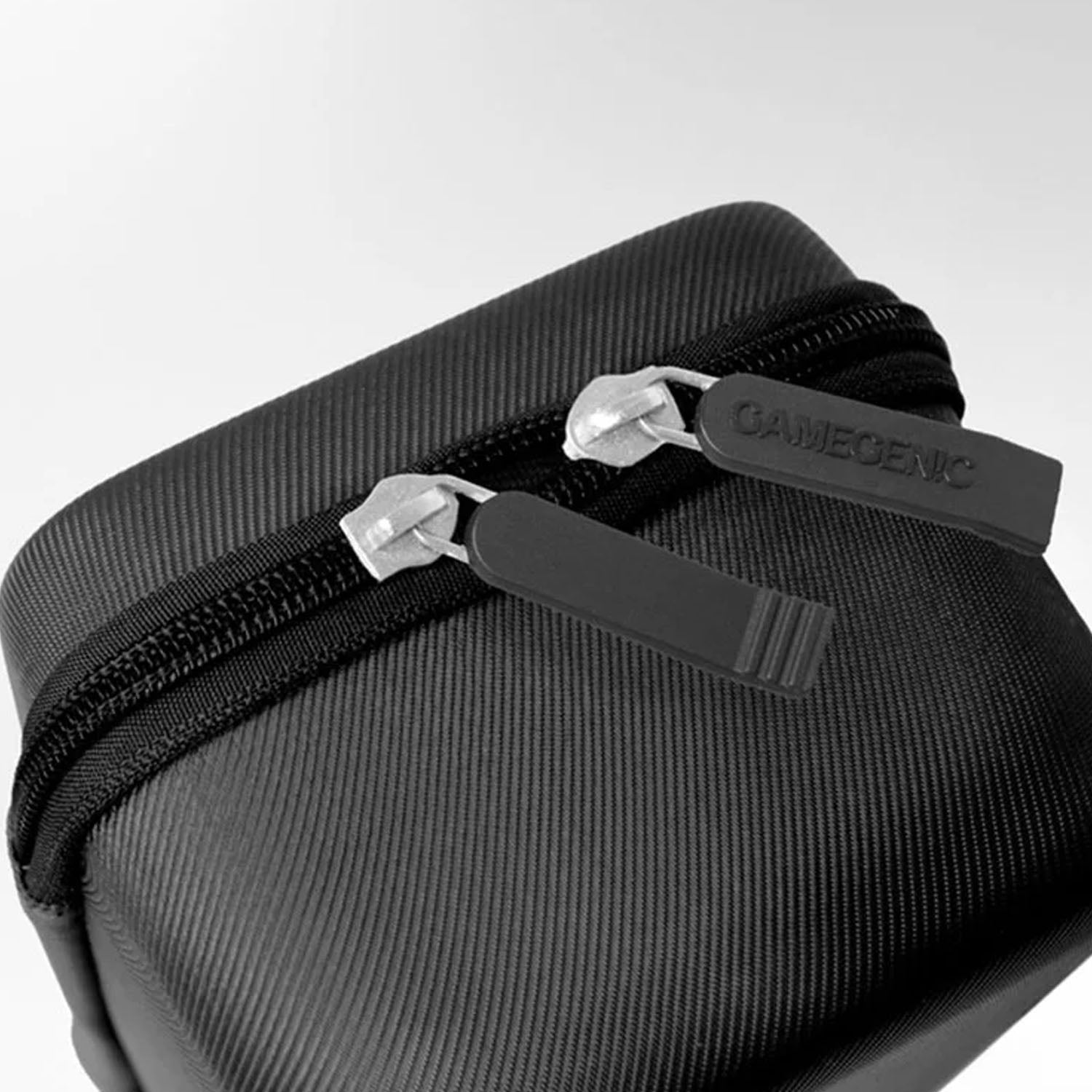 Black zippered pouch with 'Gamegenic' branding on zippers a white background