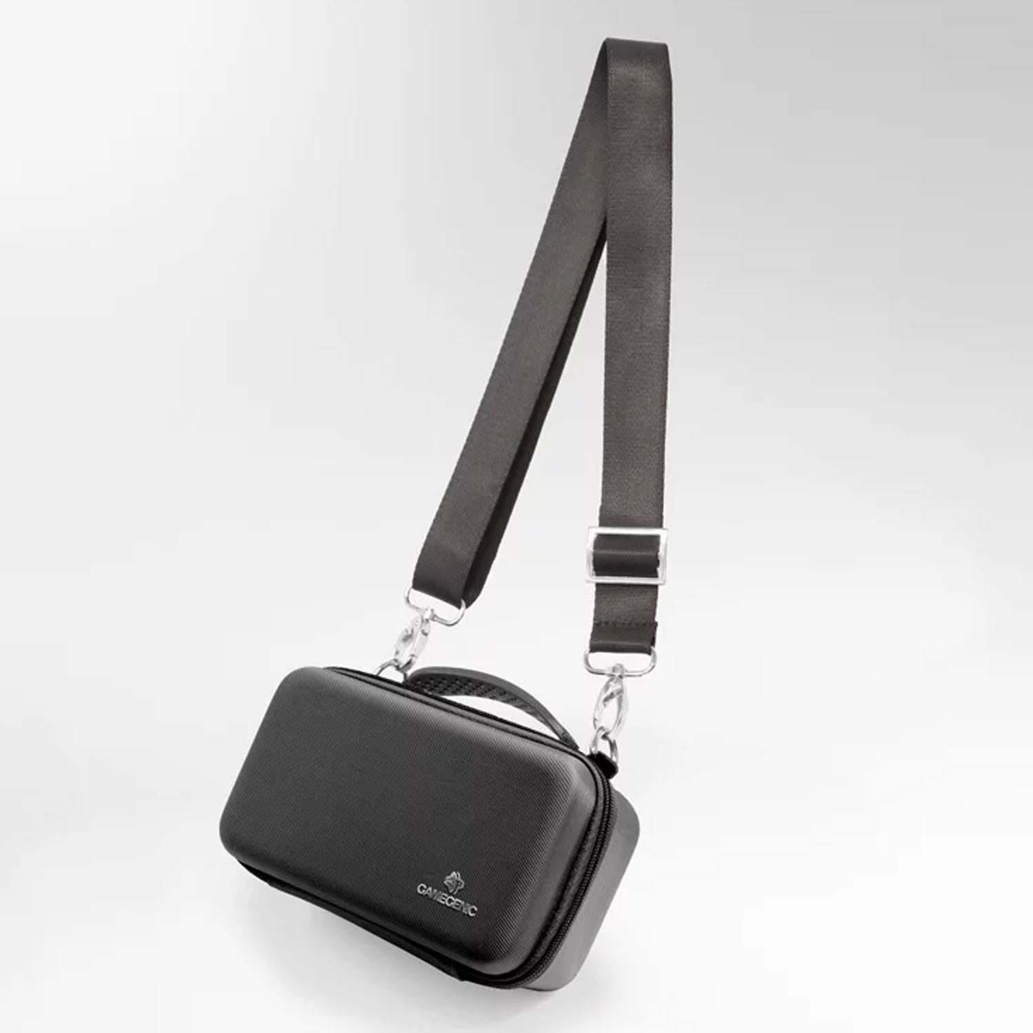 Black crossbody bag with a strap on a white background