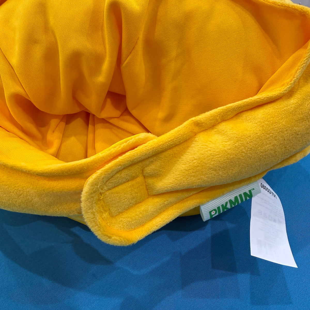 Close up of bright yellow velcro hat closure. 