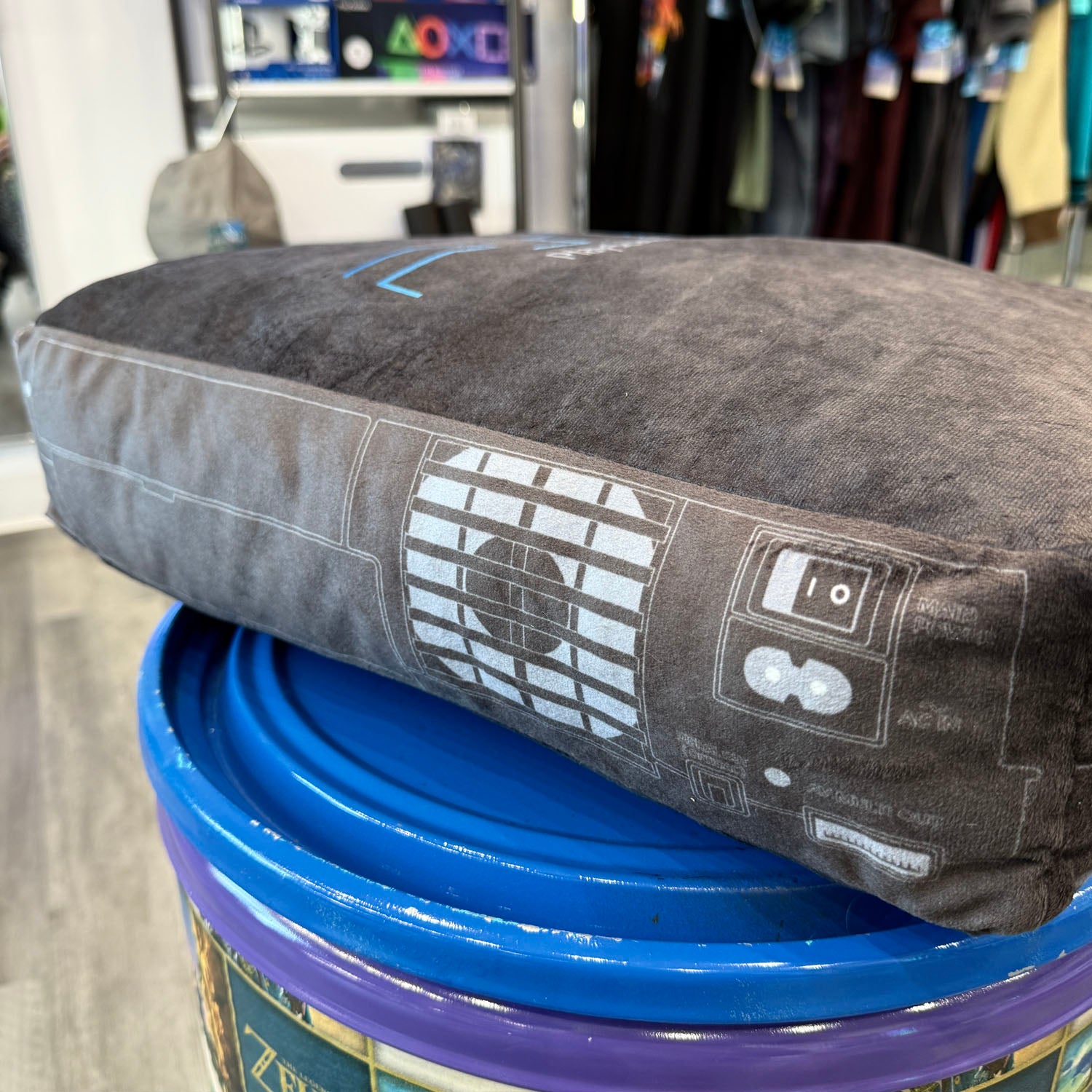 Pillow made to look like a PlayStation 2 console. Black with blue logo. 