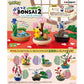 Pokémon Bonsai 2 figurines set on a decorative background with text and branding.