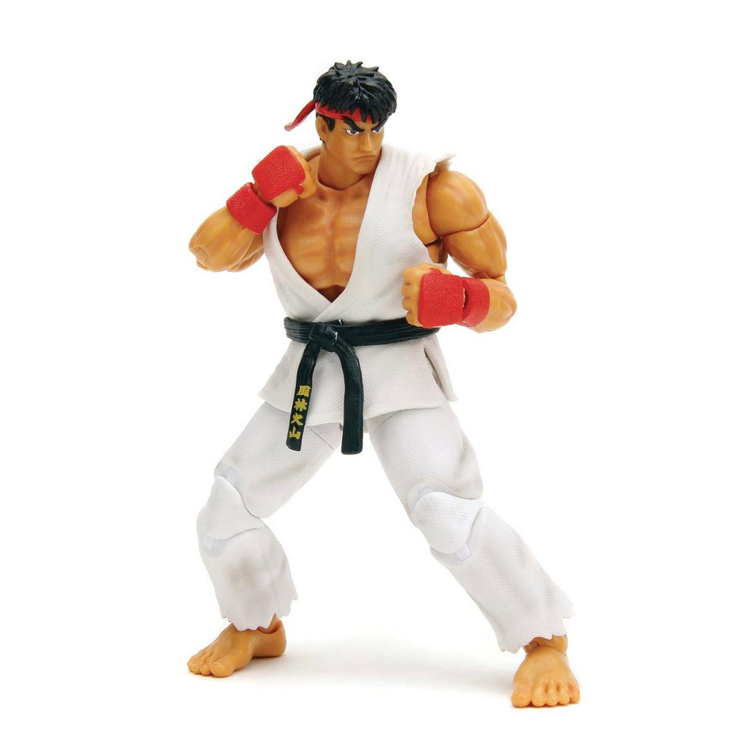 Action figure of Ryu from Street Fighter in a martial arts pose on a white background