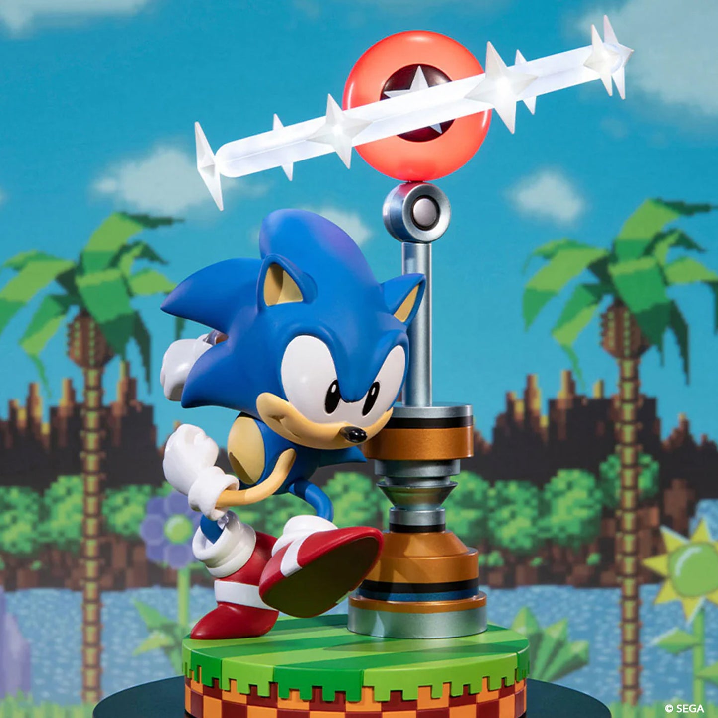 Sonic the Hedgehog figurine with a retro-style background