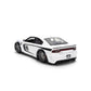 A white diecast model car with black and blue racing decals, shown from a rear three-quarter angle on a clean white background.