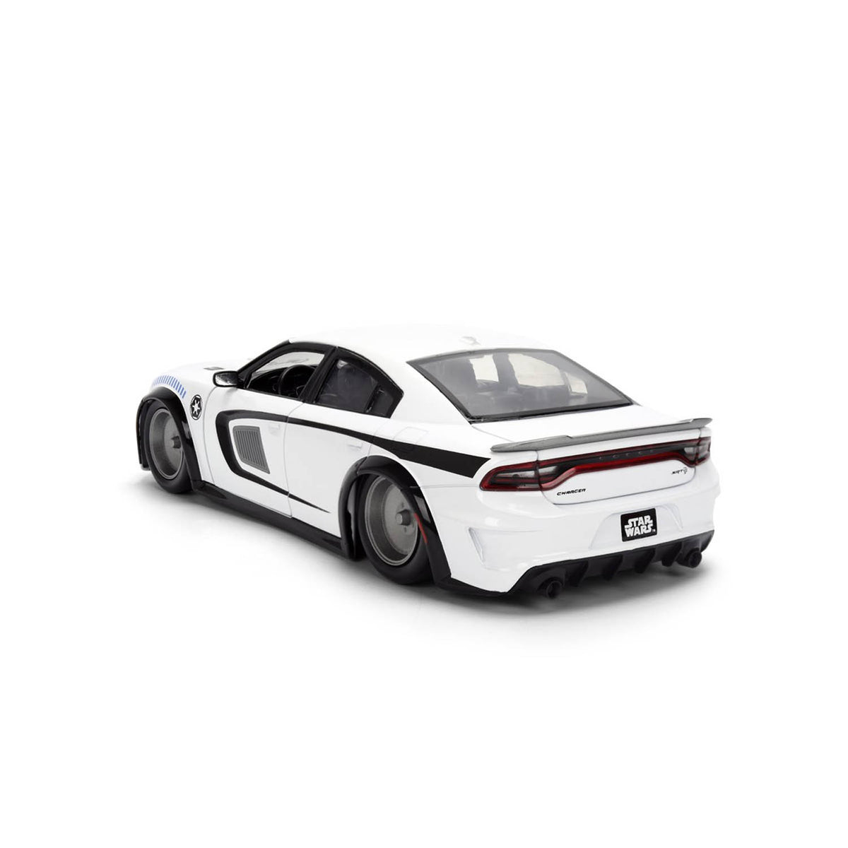 A white diecast model car with black and blue racing decals, shown from a rear three-quarter angle on a clean white background.