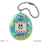 Tamagotchi device with a checkered design on a white background